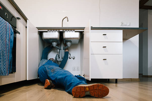 Professional Drain Cleaning technician working in Groton, NY